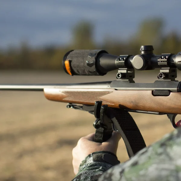 CenterPoint Universal Sunshade 74854 Outdoor Lifestyle Man Aiming Rifle with Sunshade Equipped to Scope