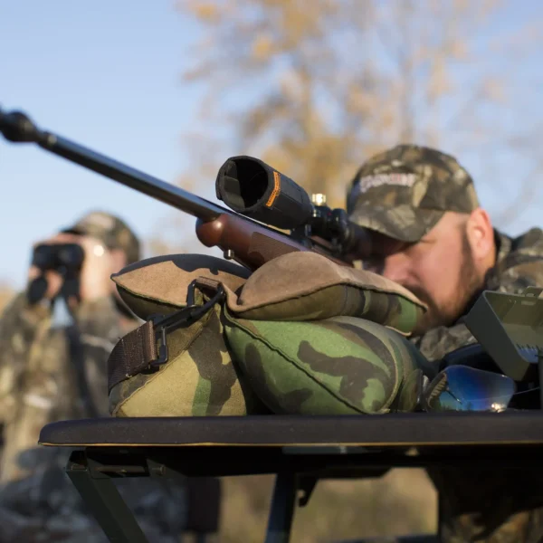 CenterPoint Universal Sunshade 74854 Outdoor Lifestyle Man Aiming Rifle with Sunshade Equipped to Scope