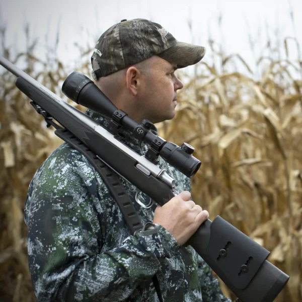 CenterPoint 4-16x40mm Riflescope LR416AORG2 Outdoor Lifestyle Man with Rifle Idle near Cornfield